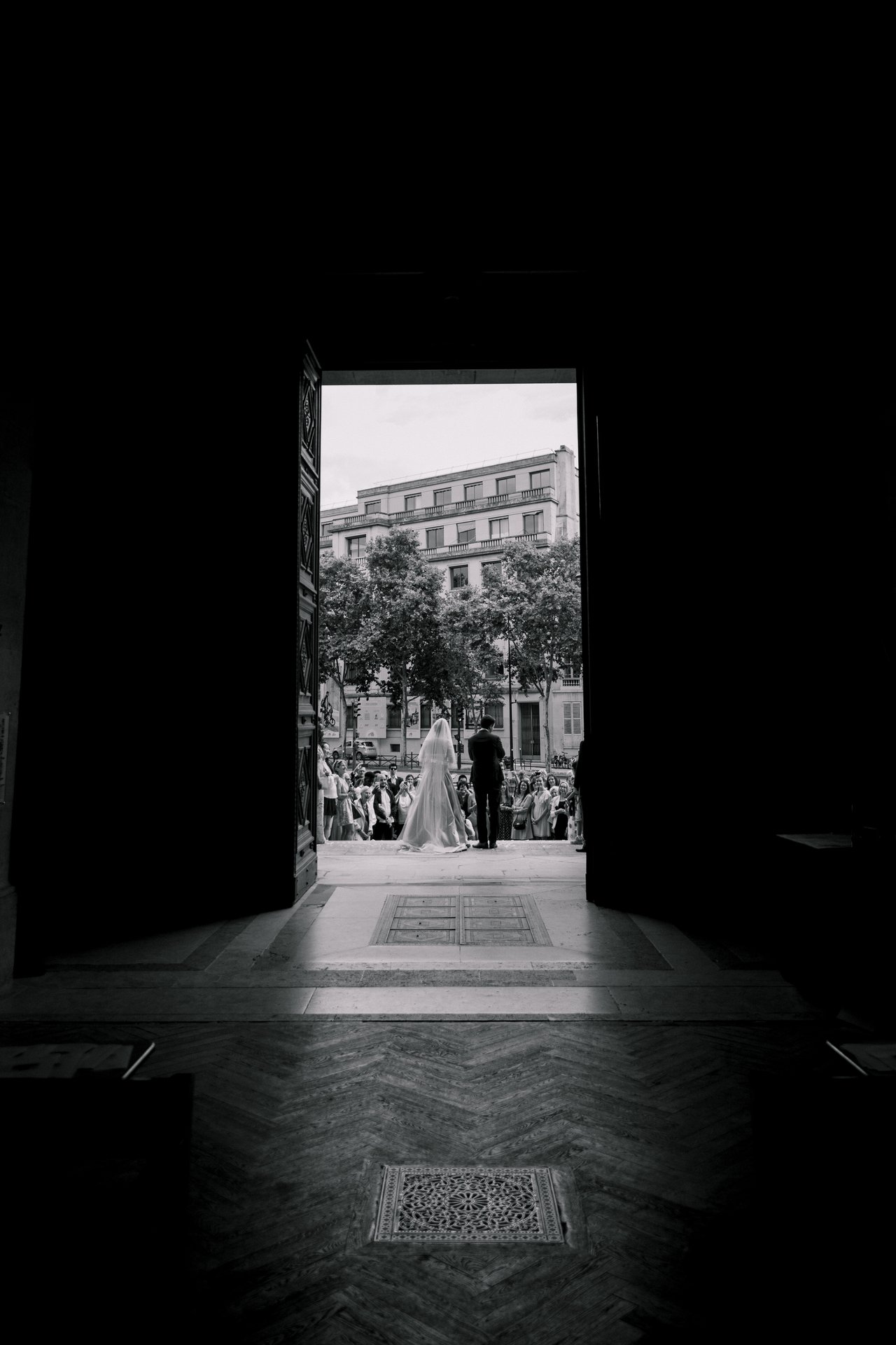 Editorial wedding photography in Paris, France — church entrance ceremony